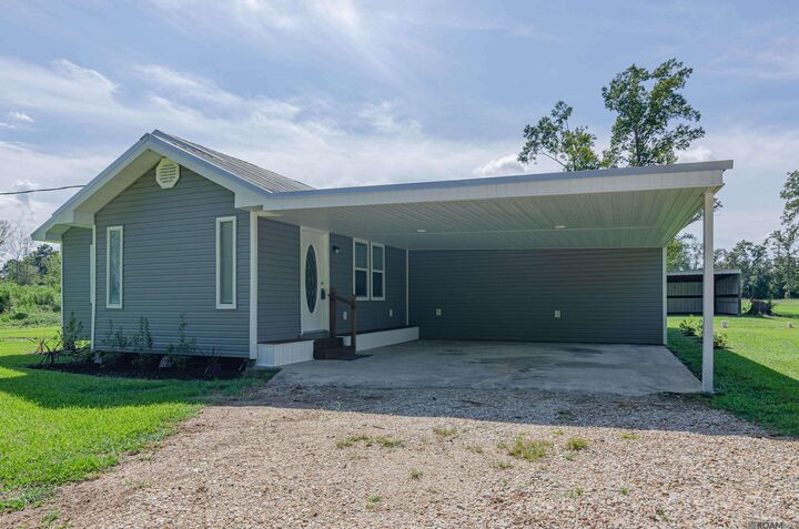 Property Photo:  15687 Penalber Rd  LA 70449 