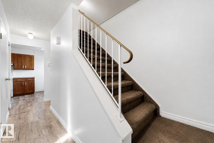 Property Photo: 303 Primrose Gardens Gd NW AB T5T 0R1