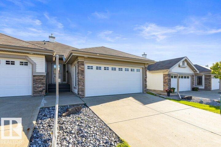Property Photo:  4 Heritage Way 11  AB T8N 6W3 