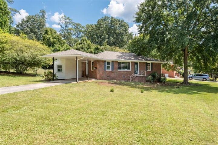 Property Photo: 208 SE Yancy Drive SE GA 30067