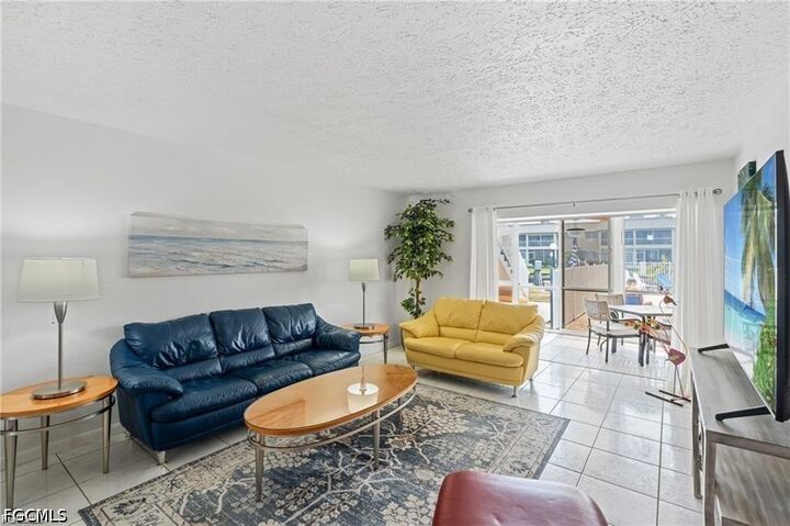 Property Photo: 1006 SE 46th Street 1B FL 33904