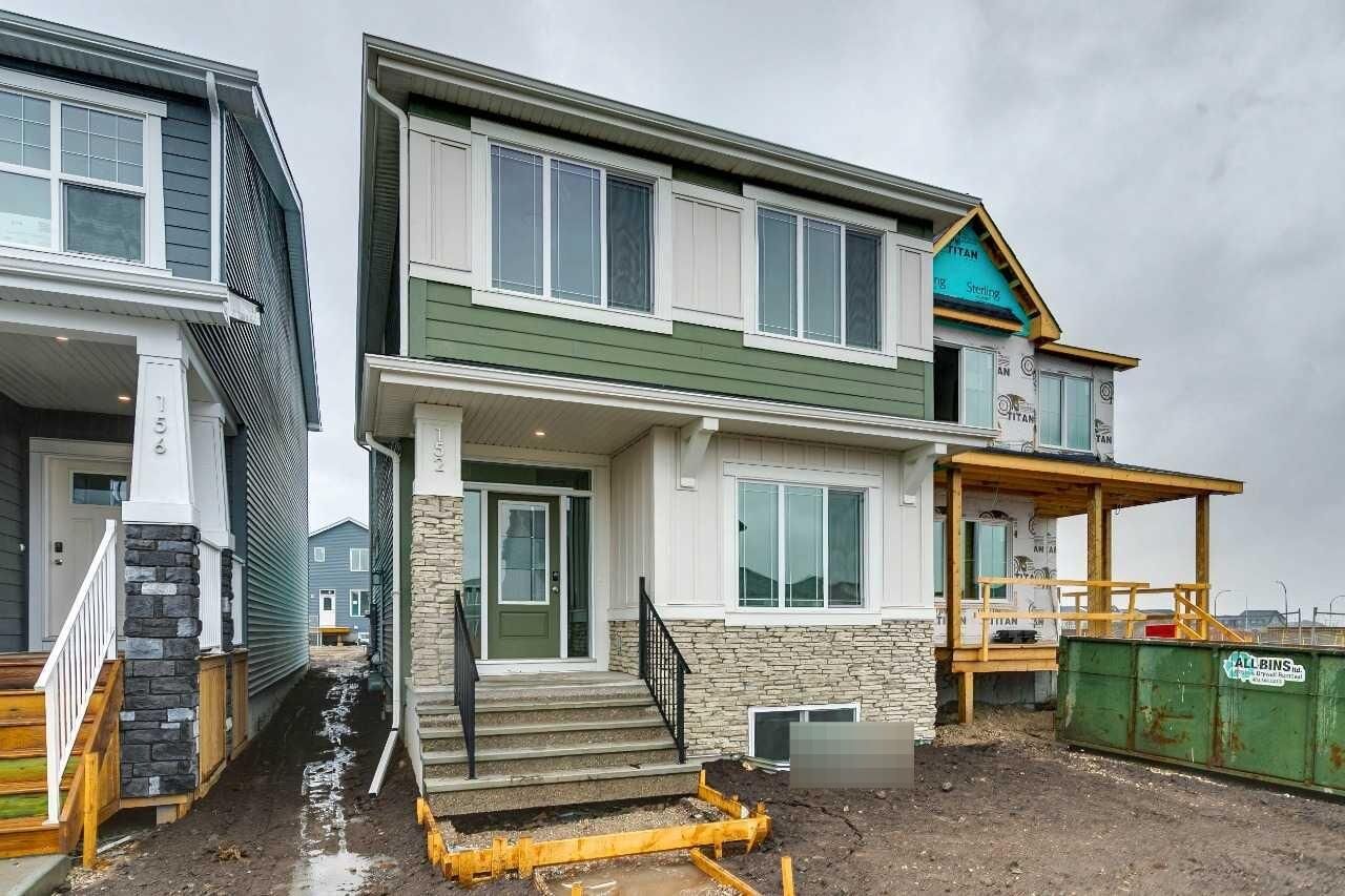 Property Photo:  152 Snowberry Common SE  AB T3M 4G7 