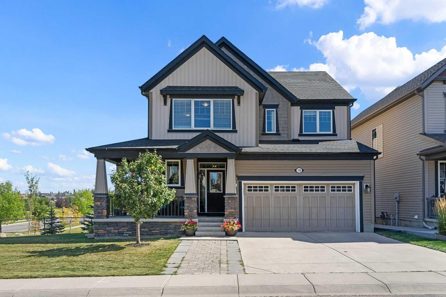 Property Photo:  10 Windcreek Terrace SW  AB T4B 0Y4 