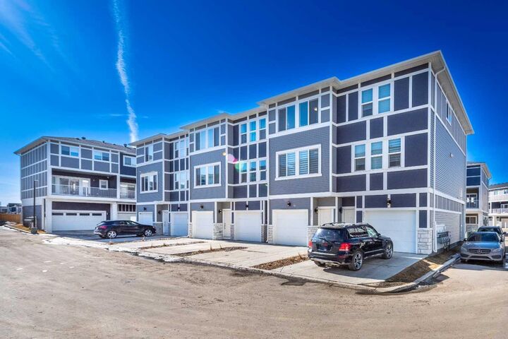 Property Photo: 33 Merganser Drive W 902 AB T1X 2S3