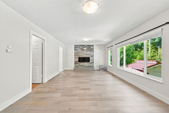 Property Photo:  5553 Nancy Greene Way Main  BC V7R 4R6 