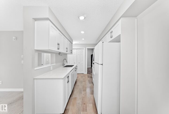 Property Photo:  11511 27 Avenue NW 220  AB T6J 7J8 