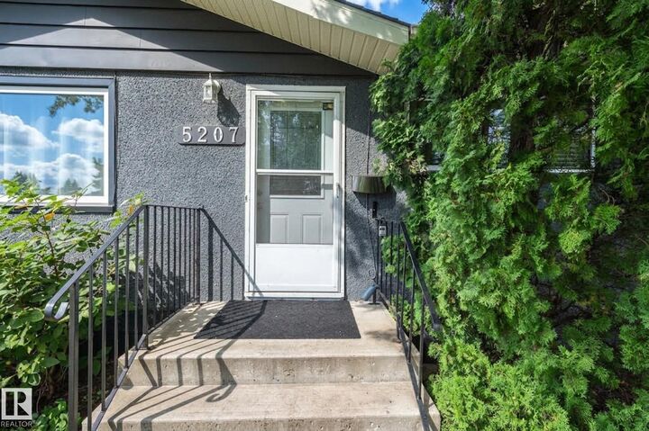 Property Photo:  5207 103 Avenue NW  AB T6A 0T1 