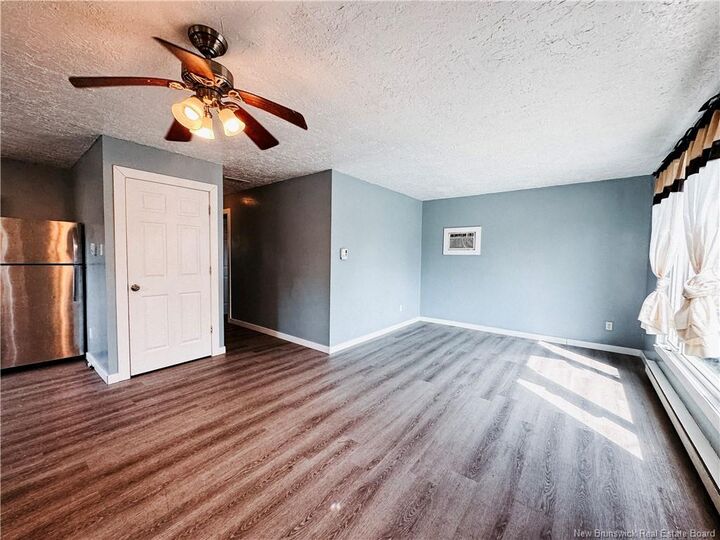 Property Photo:  118 Cedar Street  NB E1C 7L4 