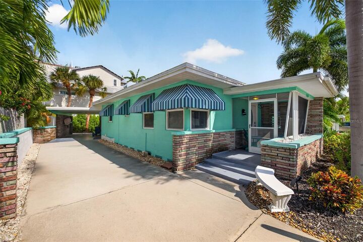 Property Photo:  114 81st Street  FL 34217 