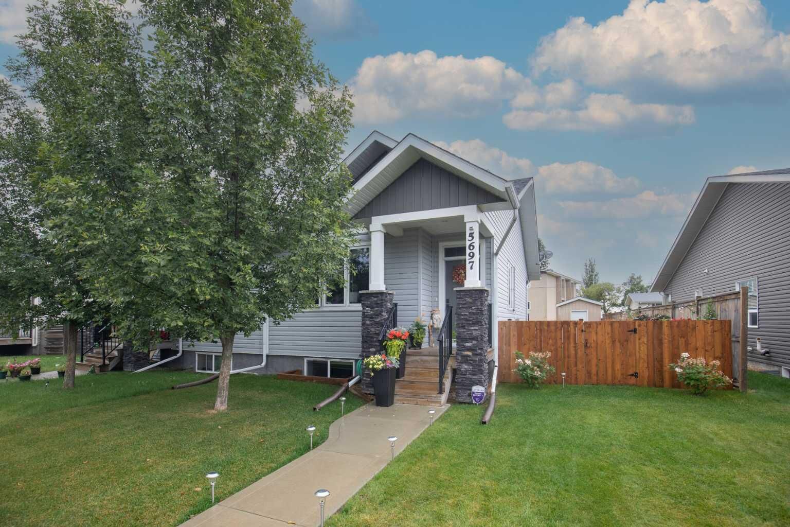 Property Photo:  5697 45 Avenue  AB T4L 1M6 