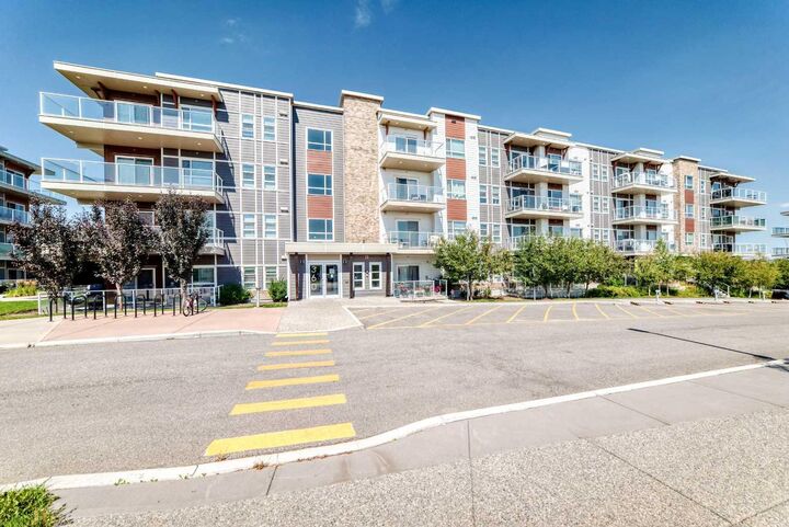 Property Photo:  360 Harvest Hills Common NE 306  AB T3K 2N1 