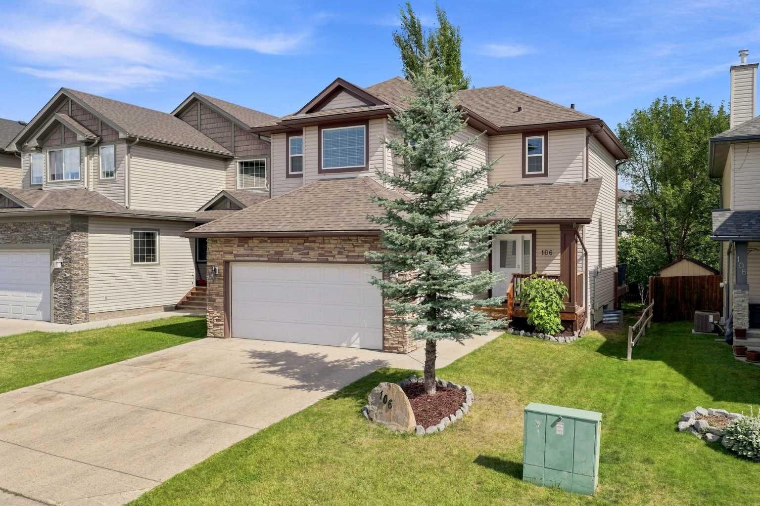 Property Photo:  106 Crystal Shores Manor  AB T1S 2H6 