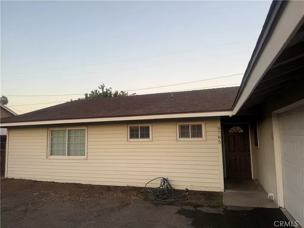 Property Photo:  9785 Vine  CA 92316 