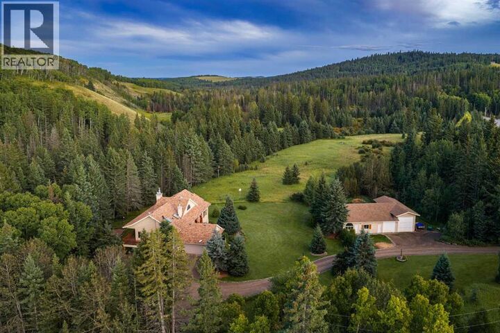 Property Photo:  272118 Coalmine Road West  AB T0L 1W4 