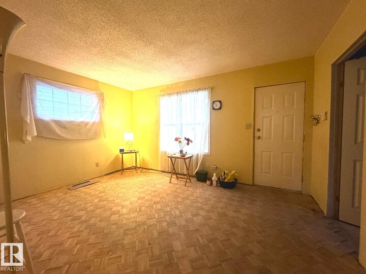 Property Photo:  11925 77 Street NW  AB T5B 2G5 