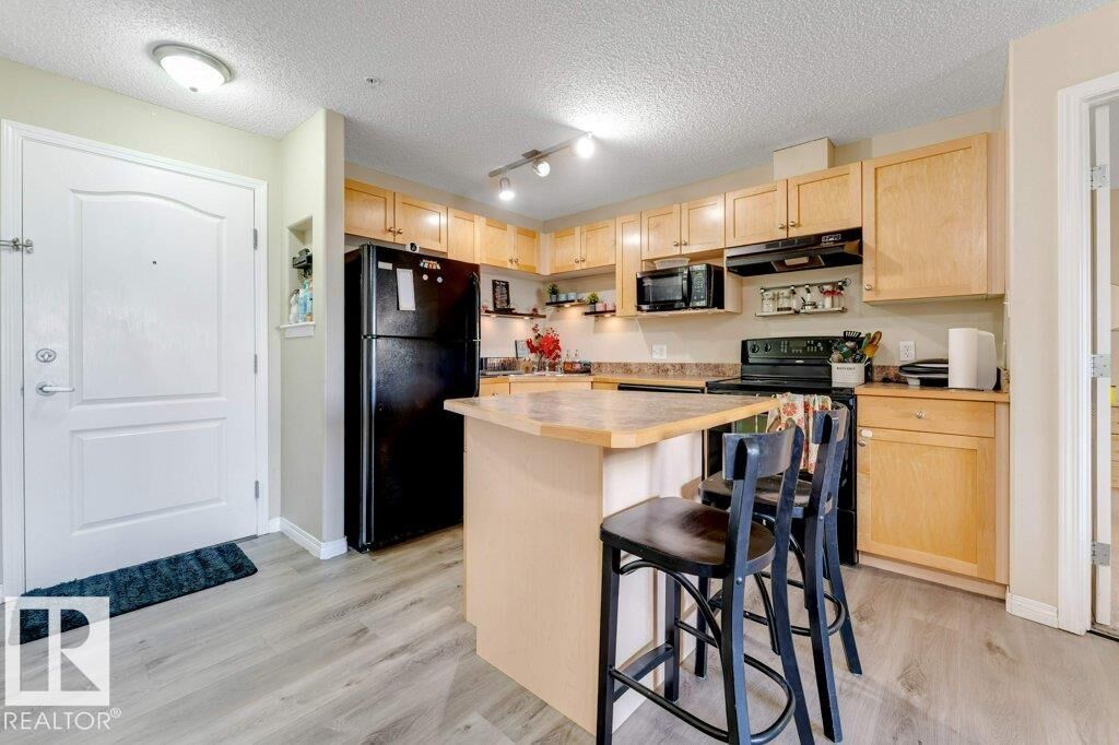 Property Photo:  3425 19 Street NW 233  AB T5T 2B5 