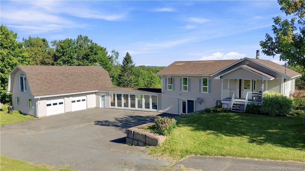 Property Photo: 100 Greenhill Lake Road NB E6E 1E9