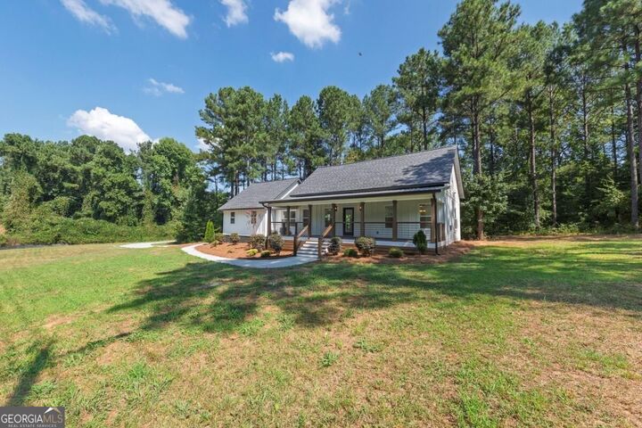 Property Photo:  1344 Puckett Road  GA 30183 