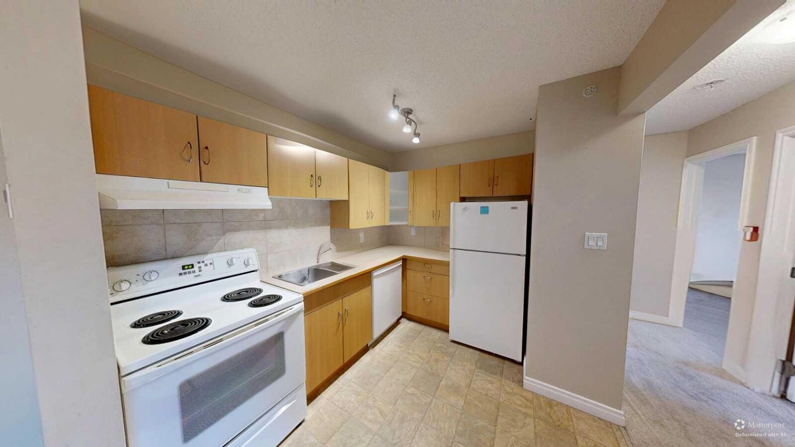 Property Photo:  4210 20 Avenue S 204  AB T1K 4X9 
