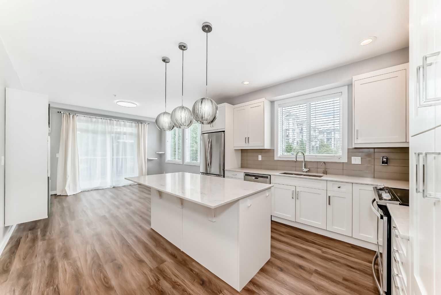 Property Photo:  522 Cranford Drive SE 4101  AB T3M 2L7 