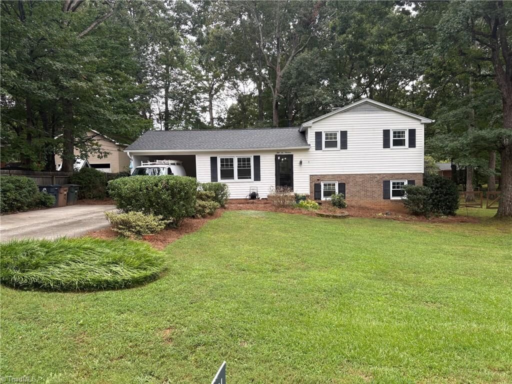 Property Photo:  5619 Virgilwood Drive  NC 27409 