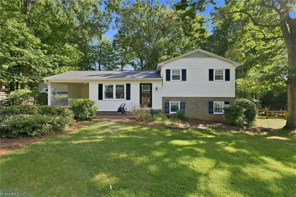 Property Photo: 5619 Virgilwood Drive NC 27409