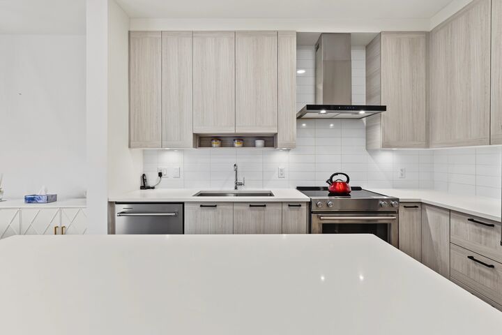 Property Photo:  7169 14th Avenue 218  BC V3N 0H6 