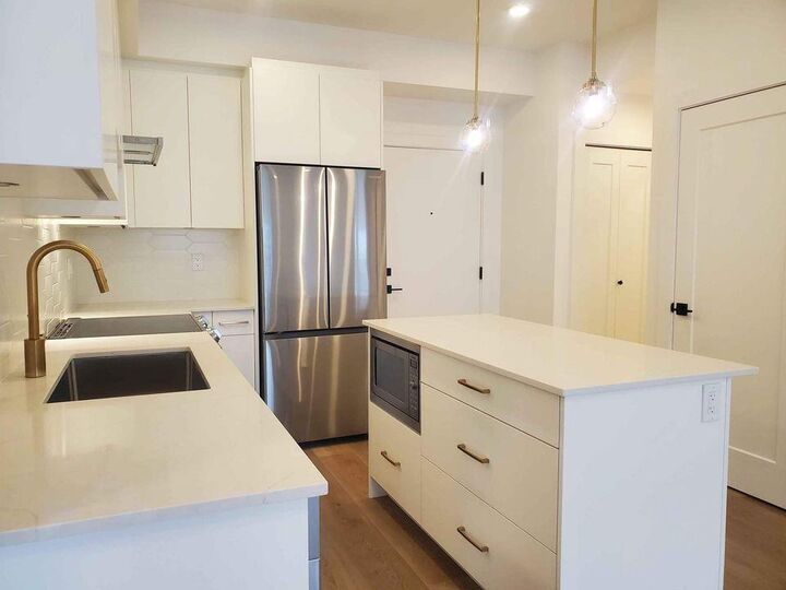 Property Photo:  20282 72B Avenue 411  BC V2Y 1T9 