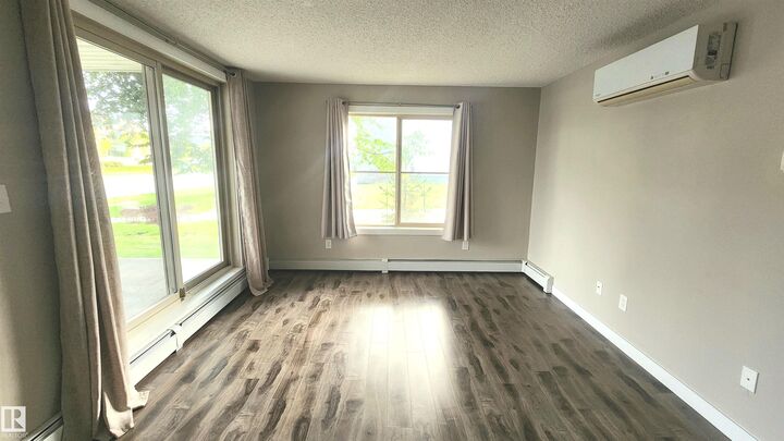 Property Photo:  11803 22 Avenue SW 101  AB T6W 2R9 