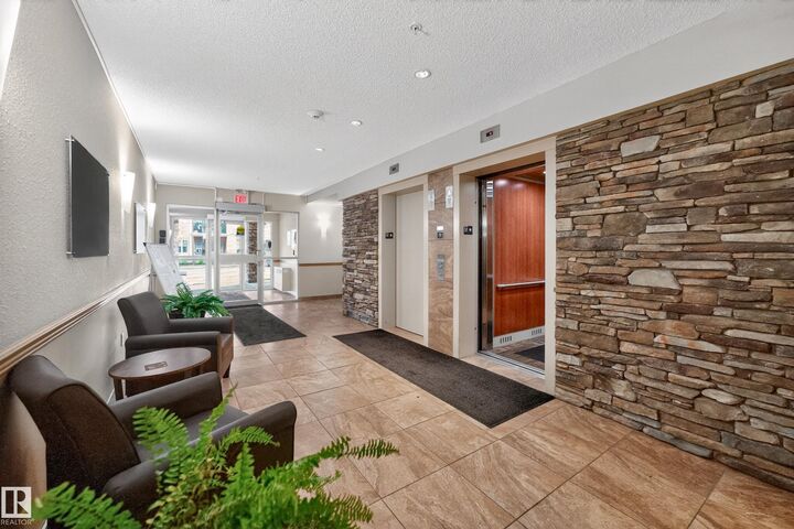 Property Photo:  2045 Grantham Court NW 215  AB T5T 3X6 