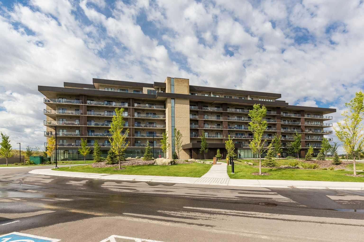 Property Photo:  102 Scenic Drive N 214  AB T1H 5L9 