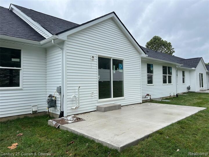 Property Photo:  821 Nelsons Ridge Drive 12  MI 48843 