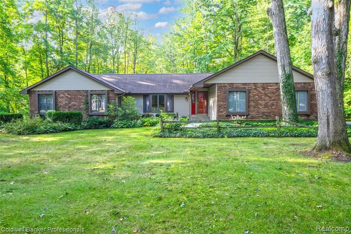 Property Photo: 155 Saratoga Trail MI 48446