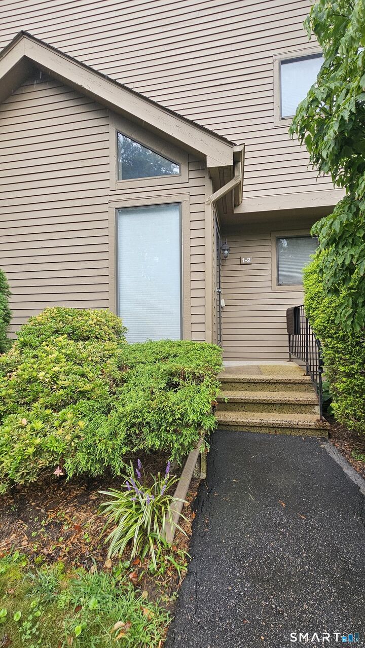 Property Photo: 1 Canterbury Court 2 CT 06457