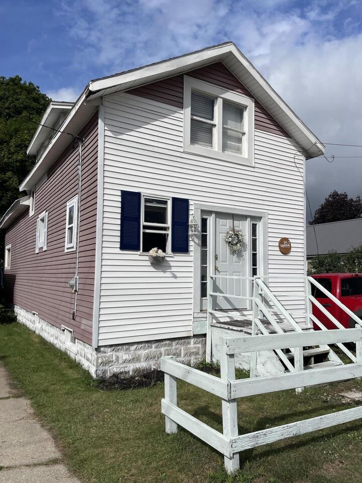 Property Photo:  162 Harrison Street  MI 49660 