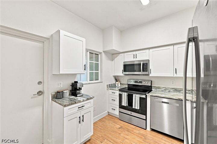 Property Photo:  8423 Bernwood Cove Loop 410  FL 33966 