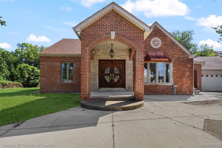 Property Photo:  214 N Beech Daly Road  MI 48127 