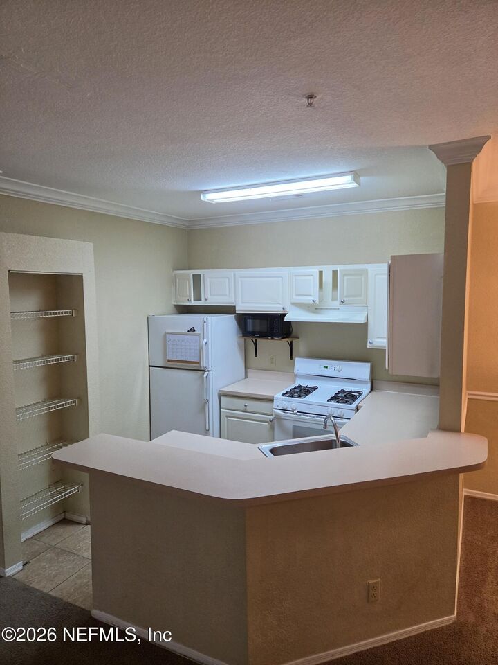 Property Photo: 13810 Sutton Park Drive 1526 FL 32224