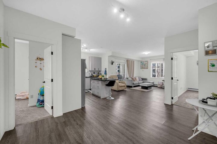 Property Photo:  151 Legacy Main Street SE 8218  AB T2X 5C7 