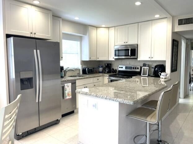 Property Photo:  184 Tuscany C  FL 33446 