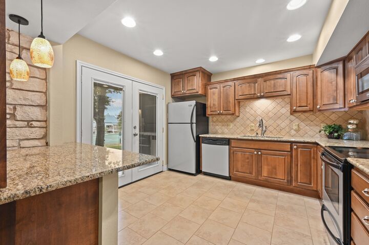 Property Photo:  176 World Of Tennis Square  TX 78734 