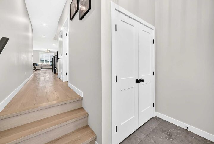 Property Photo:  203 Greenwich Drive NW  AB T3B 6N9 