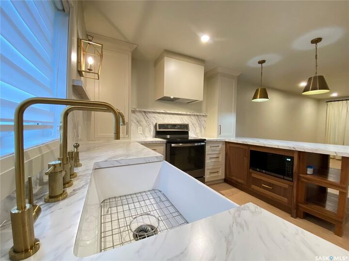 Property Photo:  324 Sully Avenue  SK S4N 4K1 