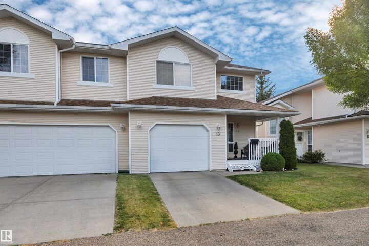 Property Photo:  6608 158 Avenue NW 13  AB T5Z 3H1 