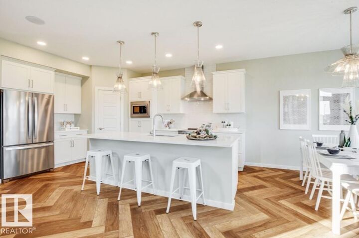 Property Photo:  2345 Muckleplum Way SW  AB T6X 3J9 