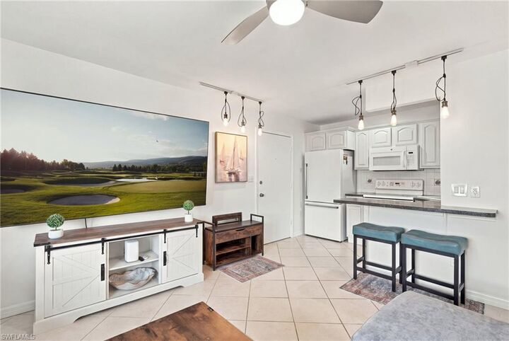 Property Photo: 457 Tallwood St 408 FL 34145