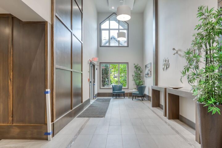 Property Photo:  15 Sunset Square 2203  AB T4C 0E7 