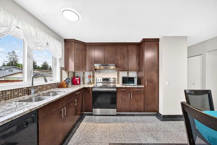 Property Photo:  4912 Rundlehorn Drive NE  AB T1Y 1B9 