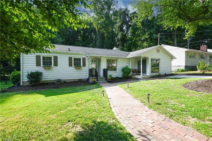 Property Photo:  3801 Parkwood Drive  NC 27403 
