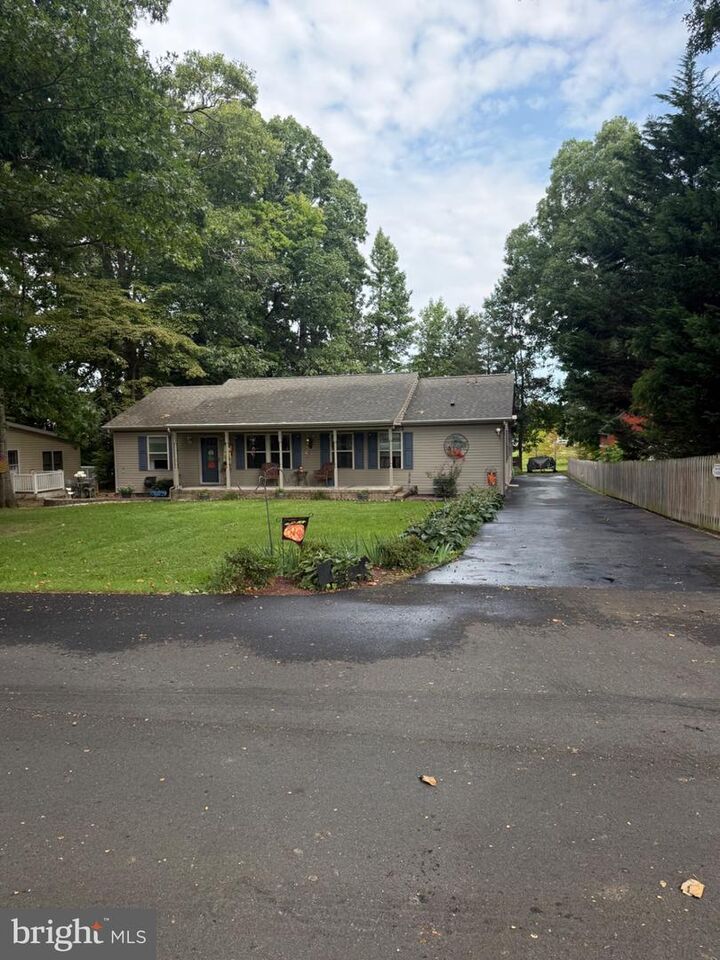 Property Photo:  32274 Robin Hoods Loop  DE 19966 
